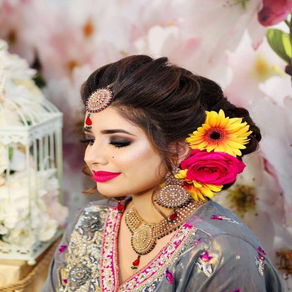 mehndi-bride-with-flowers-in-updo